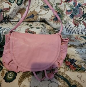 A unique little pink leather handbag